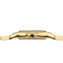 Side view of the Panthère de Cartier Small Model watch by Cartier in yellow gold, featuring a blue sapphire crown and showcasing its curved case and band against a white background.