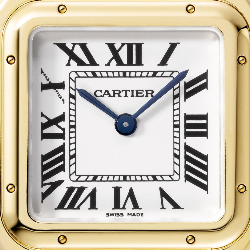 Close-up of a Cartier Panthère de Cartier watch face with Roman numerals, blue steel hands, and an 18K yellow gold bezel, displaying the time near 1:50—an enduring icon of Cartiers timeless style.