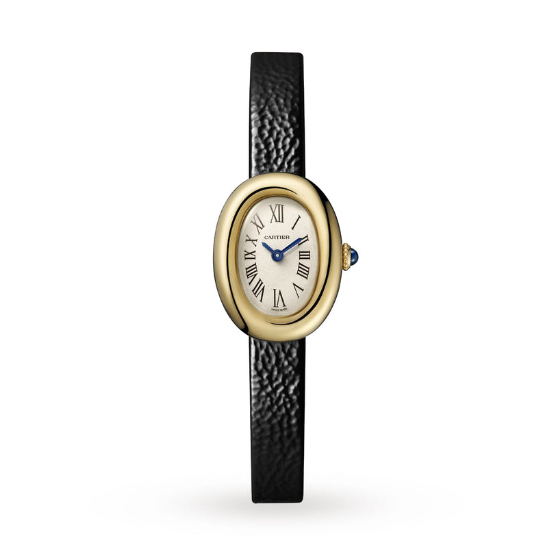 The Baignoire by Cartier is an 18K yellow gold oval wristwatch with a white dial, black Roman numerals, blue hands, quartz movement, and a black leather strap, shown on a white background.