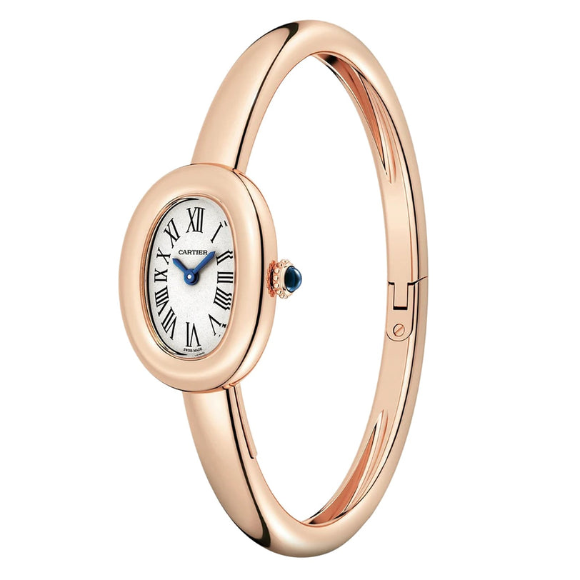 A Cartier Baignoire (Size 16) wristwatch featuring a gold oval case, Roman numeral dial, and a slim bangle-inspired band.