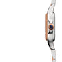 Side profile of the Panthère de Cartier Small Model by Cartier, featuring a silver rounded case, gold crown with a blue stone, and metal bracelet with rose gold accents, shown against a plain white background.