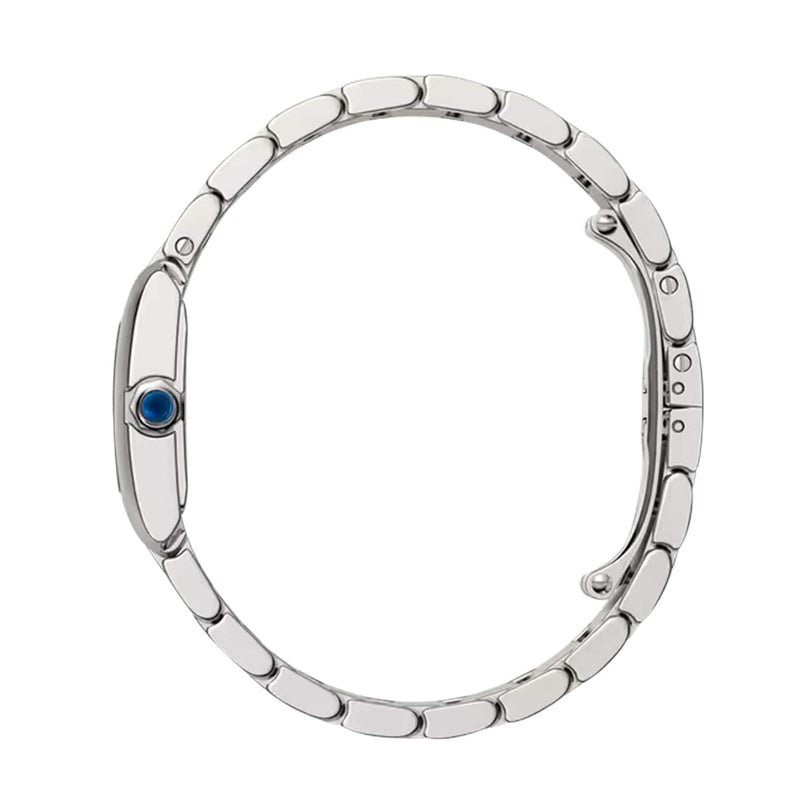 A slim Cartier Tank Française with a steel case is shown in profile, highlighting its oval blue crown and segmented bracelet; the quartz movement remains unseen as the watch face is not in view.