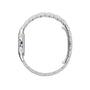 A side view of the Panthère de Cartier watch by Cartier shows its silver metal circular band and blue crown, reflecting the brand’s elegant design.