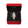 A Panthère de Cartier watch with a two-tone metal band and diamond-set bezel rests in a signature red Cartier jewelry box lined with black velvet.
