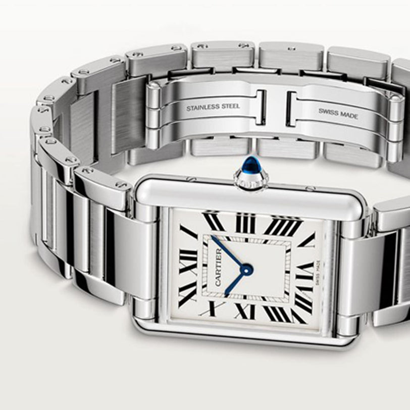 Cartier Tank Must de Cartier watch with a rectangular face, Roman numerals, and a stainless steel bracelet.