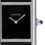 Close-up of a Cartier Tank Must de Cartier watch featuring a black dial, silver hands, blue cabochon crown, and CARTIER and SWISS MADE on the face. Paired with an elegant black alligator-skin strap for timeless style.