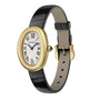 The Cartier Baignoire (Size 15) wristwatch features a gold case, white oval face with Roman numerals, black leather strap, blue cabochon crown, and gold buckle—embodying timeless elegance against a white background.