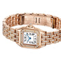 The Panthère de Cartier Watch by Cartier features an 18K rose gold rectangular case, Roman numerals, blue hands, and diamond-set bezel and bracelet, pictured here with the clasp open.
