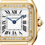 Close-up of the Cartier Panthère De Cartier Watch with an 18K yellow gold case, diamond bezel, Roman numeral hour markers, blue hands, and Swiss Made on the dial.