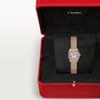 A Panthère De Cartier Watch by Cartier with a metal band, displayed in an open red Cartier box featuring a black interior.