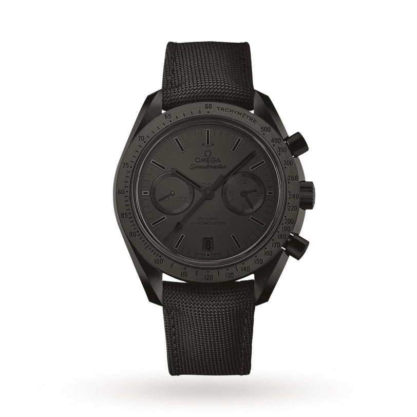 An OMEGA Speedmaster Dark Side of the Moon Black Black chronograph with a fabric strap, three subdials, and a tachymeter bezel is photographed on a white background.