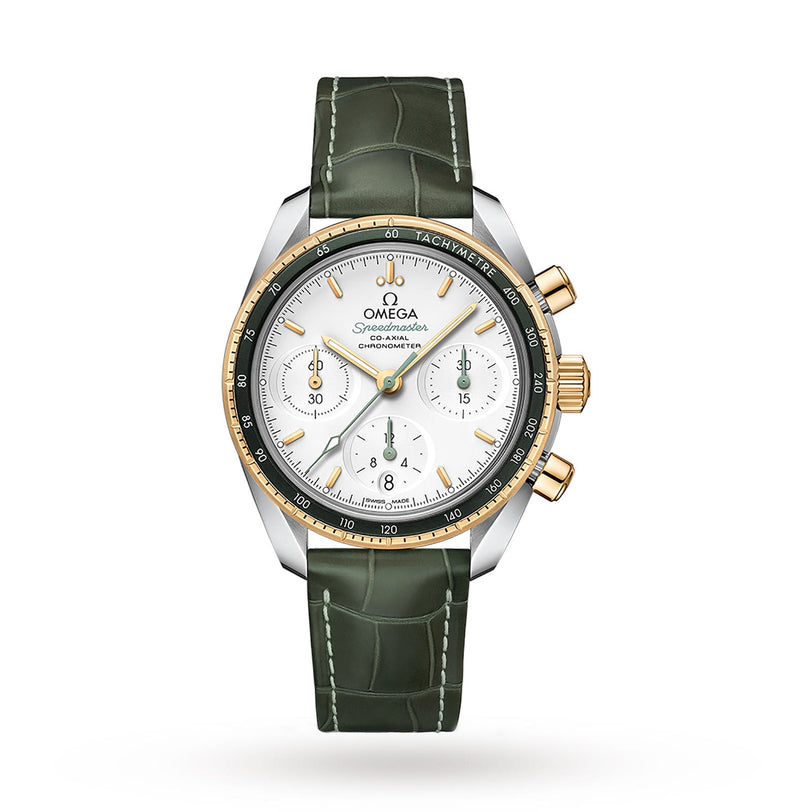 A luxury OMEGA Speedmaster 38 wristwatch with a white dial, gold bezel, green leather strap, and three subdials, powered by the precise Co-Axial calibre—a tribute to historic lunar mission timepieces.