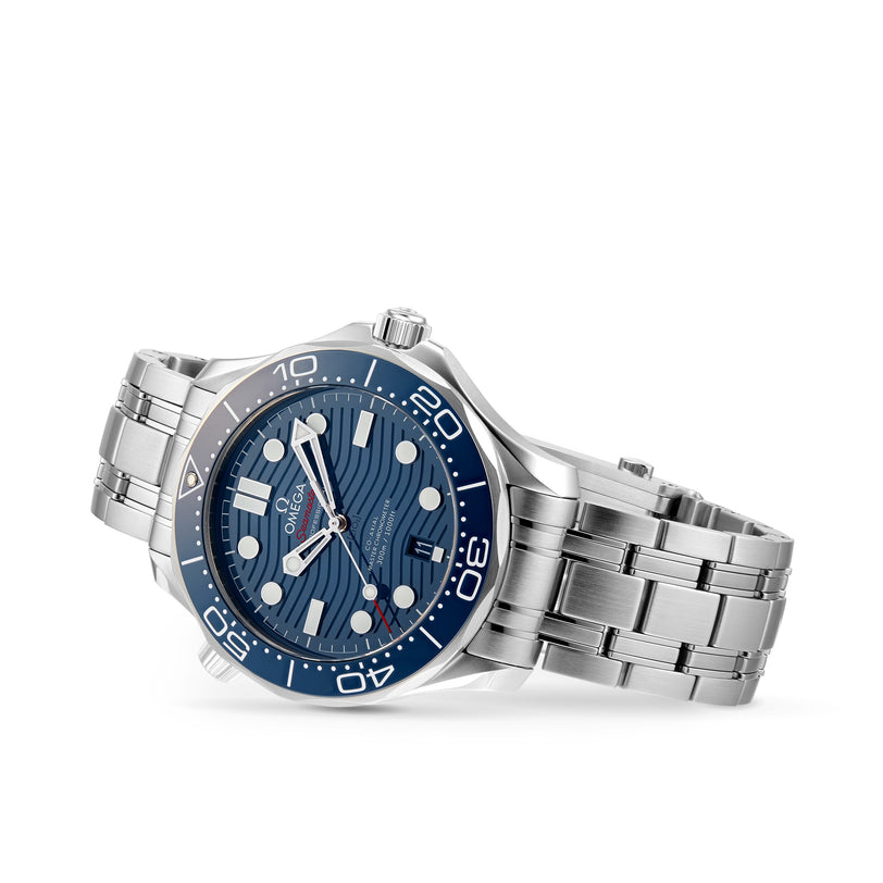 An OMEGA Seamaster Diver 300M wristwatch in stainless steel, featuring a blue dial, white markers, and a metal bracelet, displayed at an angle on a white background.