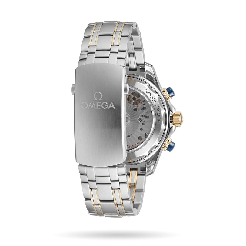 Back view of an OMEGA Seamaster Diver 300M in silver and gold, featuring a clasp with the OMEGA logo and the mechanical movement visible through the transparent case back.