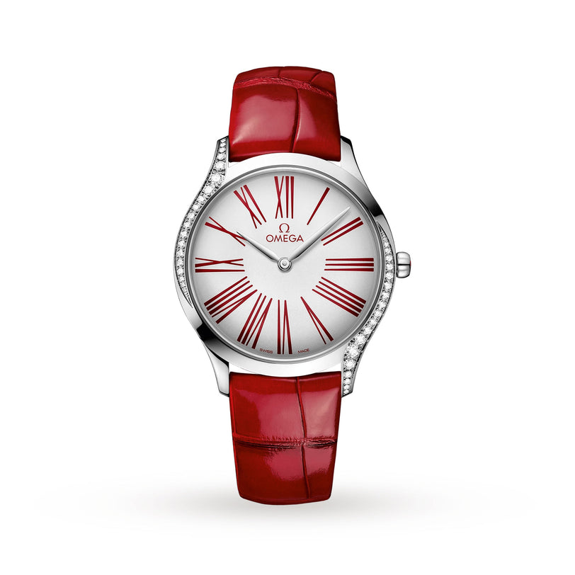 OMEGA’s De Ville Tresor 36 features a silver dial with red Roman numerals, a red leather strap, and sparkling diamonds on one side of the stainless steel case—a striking diamond-accented wristwatch.