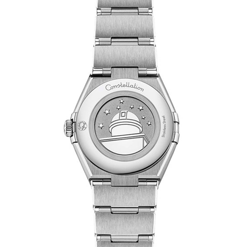 The stainless steel back of the OMEGA Constellation wristwatch features an engraved observatory, stars, and the word Constellation, embodying the signature elegance of OMEGAs Constellation collection.