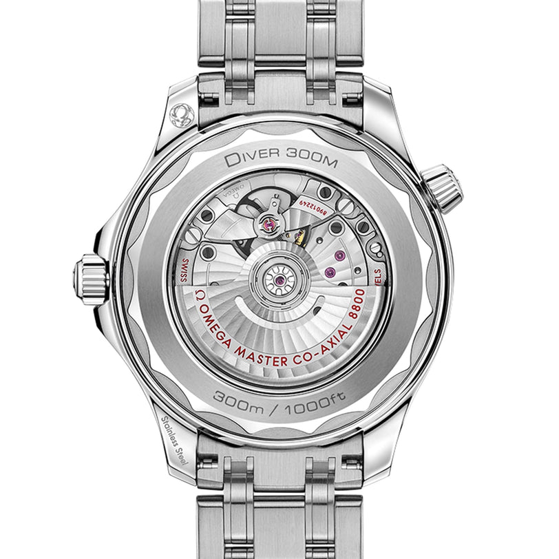 Close-up of the OMEGA Seamaster Diver 300M case back reveals the Master Chronometer Calibre 8800 movement and engraved details, including Diver 300M and 300m/1000ft—an iconic Bond watch.