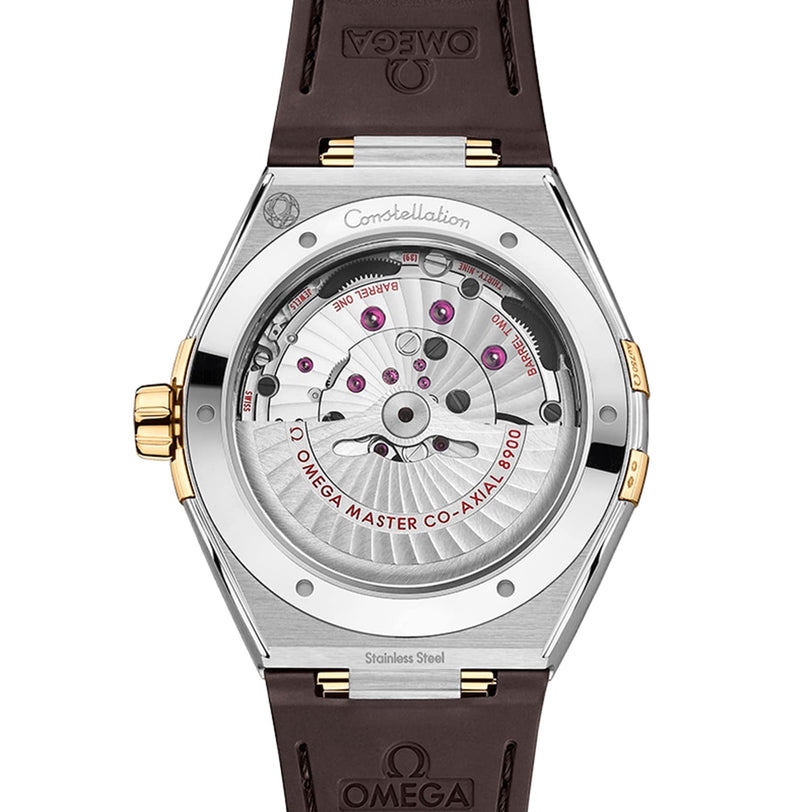 Close-up of the OMEGA Constellation watch, highlighting its 8900 calibre movement and master chronometer certification, housed in stainless steel and gold with a brown leather strap—a tribute to the Constellation heritage.