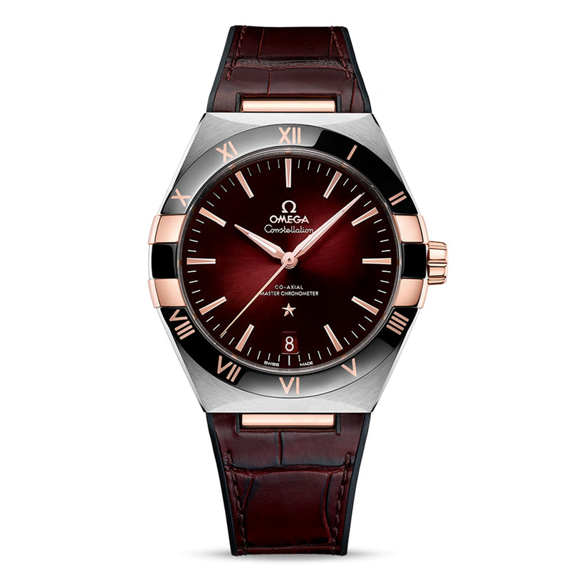 The OMEGA Constellation wristwatch features a brown leather strap, burgundy dial, gold hour markers, and a silver-gold case with Master Chronometer certified precision.