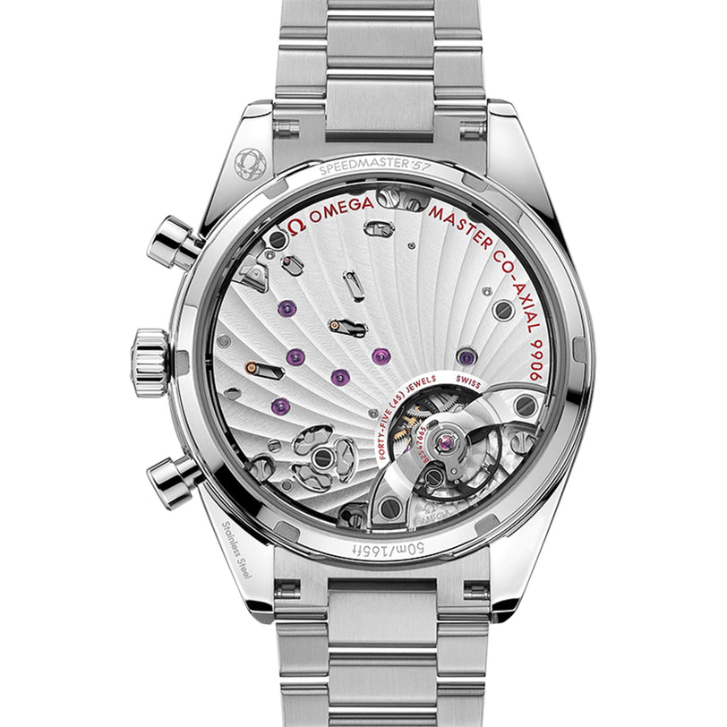 The back view of the OMEGA Speedmaster 57 reveals its stainless steel case and exposed movement with visible gears and engraved details, all complemented by a matching steel bracelet.