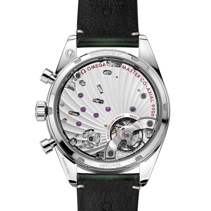 Back view of the OMEGA Speedmaster 57 showing its mechanical movement through a transparent caseback in a stainless steel case, with visible gears, jewels, and engraved details.