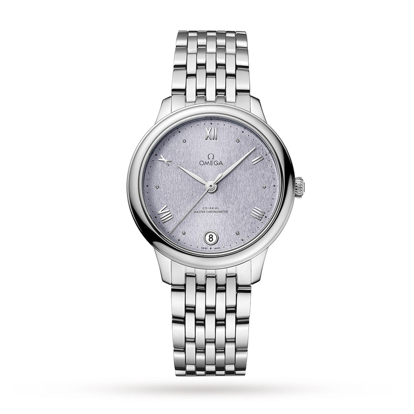 The OMEGA De Ville Prestige wristwatch features a stainless steel case, silver dial with Roman numerals, date display at 6 o’clock, and a linked metal bracelet, shown on a white background.