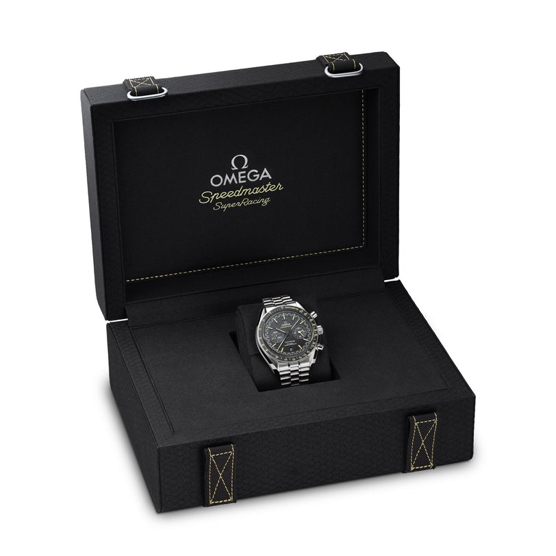 The OMEGA Speedmaster Super Racing, a luxury watch from the Speedmaster collection, is elegantly displayed in an open black presentation box with OMEGA Speedmaster branding on the inside lid.