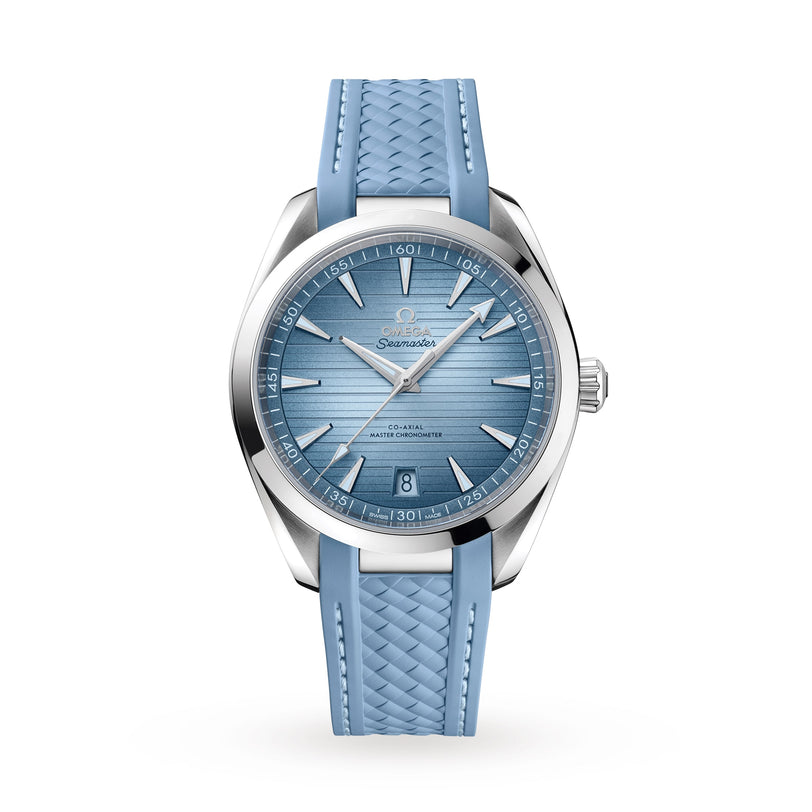 The OMEGA Seamaster Aqua Terra 150M features a textured light blue dial, silver markers, date at 6 o’clock, and a patterned blue rubber strap. Master Chronometer certified and inspired by luxury sailboats. Shown on a white background.