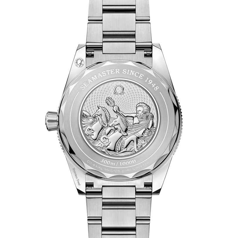 The OMEGA Seamaster 300 Summer Blue’s stainless steel caseback is engraved with a seahorse and rider, Seamaster Since 1948, water resistance info, and Co-Axial Master Chronometer Calibre 8912 details in striking Summer Blue.