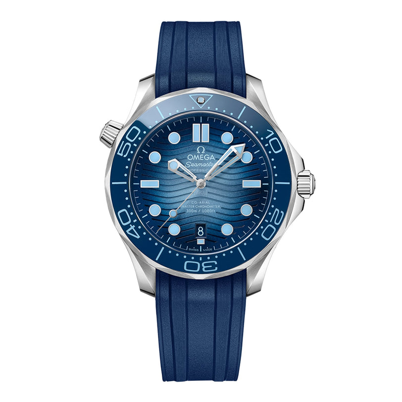 The OMEGA Seamaster Diver 300M Summer Blue features a Summer Blue bezel and dial, silver hour markers, and a blue rubber strap, shown displaying the time 10:08.