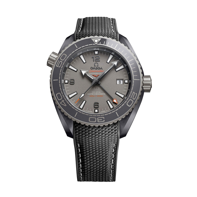 The OMEGA Seamaster Planet Ocean 600M, a grey diving watch with a textured black strap, large numerals, rotating bezel, and date window at 3 oclock, is displayed against a white background.