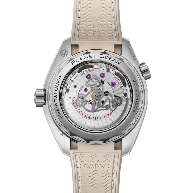 Back view of the OMEGA Seamaster Planet Ocean 600M dive watch with a transparent case back, visible mechanical movement, and beige rubber strap, exemplifying master chronometer precision and bold style.