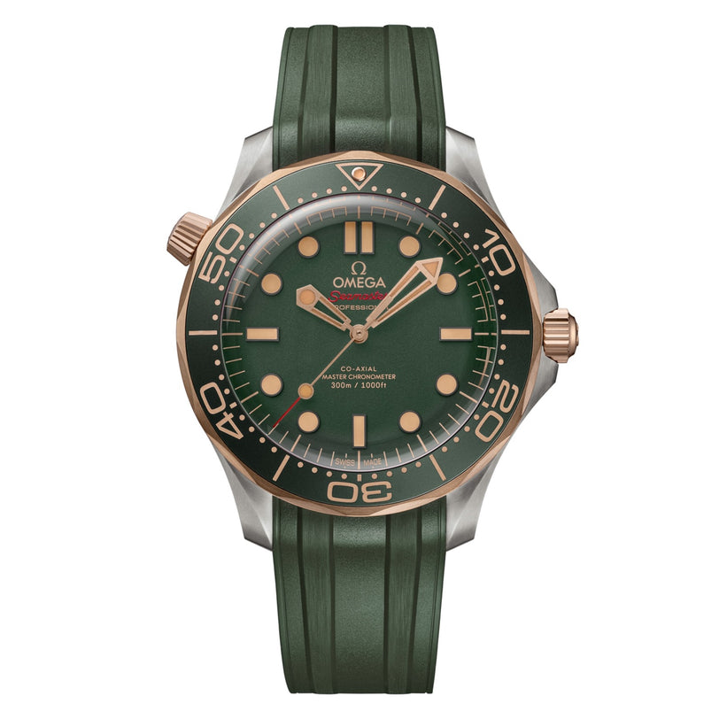 OMEGA Seamaster Diver 300M with green dial, green bezel, gold accents, and a green rubber strap. Powered by the OMEGA Co-Axial Master Chronometer Calibre 8806, this titanium and Bronze Gold watch stands out against a white background.