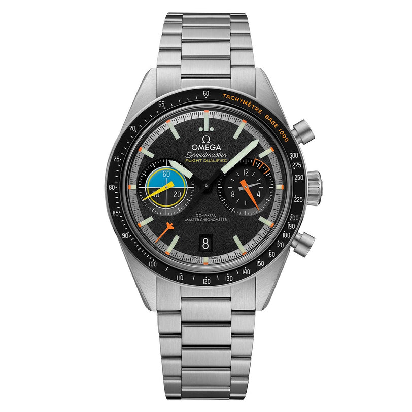 The OMEGA Speedmaster Pilot is a stainless steel wristwatch with a black dial, multi-colored subdials, tachymeter bezel, and metal bracelet, honoring the Moon landings and shown against a white background.
