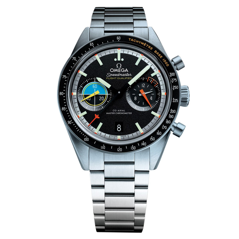 A stainless steel OMEGA Speedmaster Pilot wristwatch with a black dial, colorful chronograph subdials, date display, and metal bracelet—celebrating the iconic model worn during historic Moon landings.