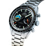 The OMEGA Speedmaster Pilot, a stainless steel watch, showcases a black dial with multicolored subdials and a tachymeter bezel, presented at an angle on its metal bracelet.