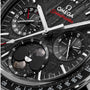 Close-up of the OMEGA Speedmaster Moonphase watch face, showcasing chronograph subdials, date indicators, and a detailed moon phase display inspired by lunar meteorite.