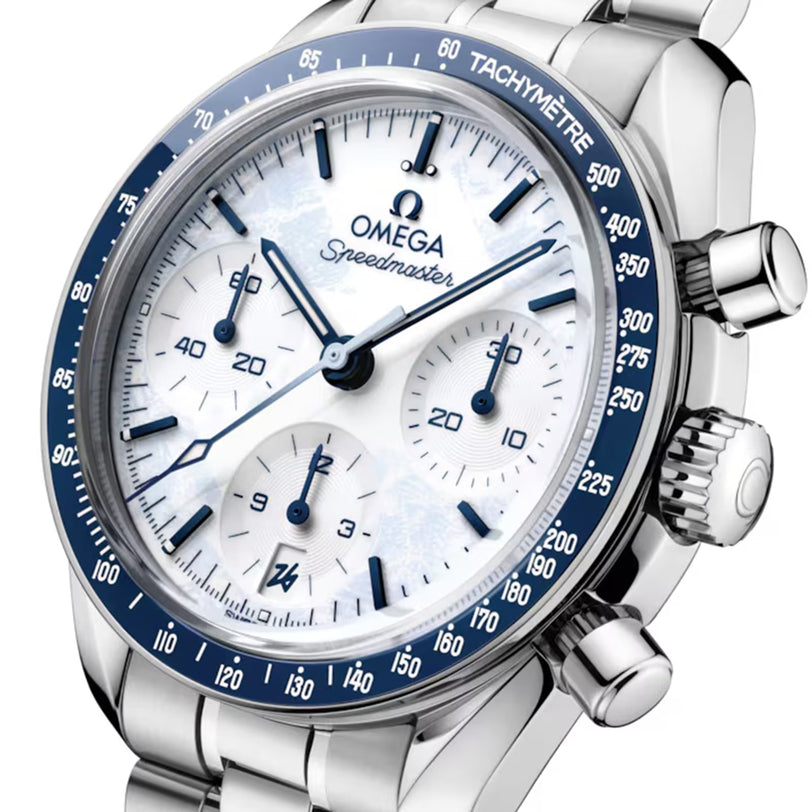 Omega Speedmaster watch with blue and silver design on a white background