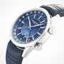 The Raymond Weil Freelancer GMT Blue Dial wristwatch features Swiss craftsmanship, 24-hour markers, a date window at 6 o’clock, and a blue leather strap.