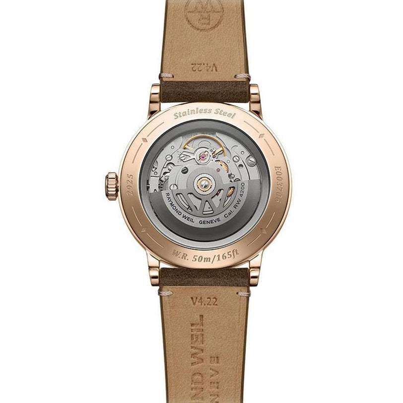 Back view of the Raymond Weil Millesime Automatic Silver Sector Dial showing its automatic movement through a transparent case back, with a brown leather strap and engraved specifications on the metal rim.