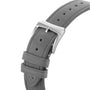 Close-up of a gray textured strap with a silver buckle engraved with Raymond Weil, featured on the Millesime Automatic Small Seconds Silver Sector Dial watch, highlighting refined horology.