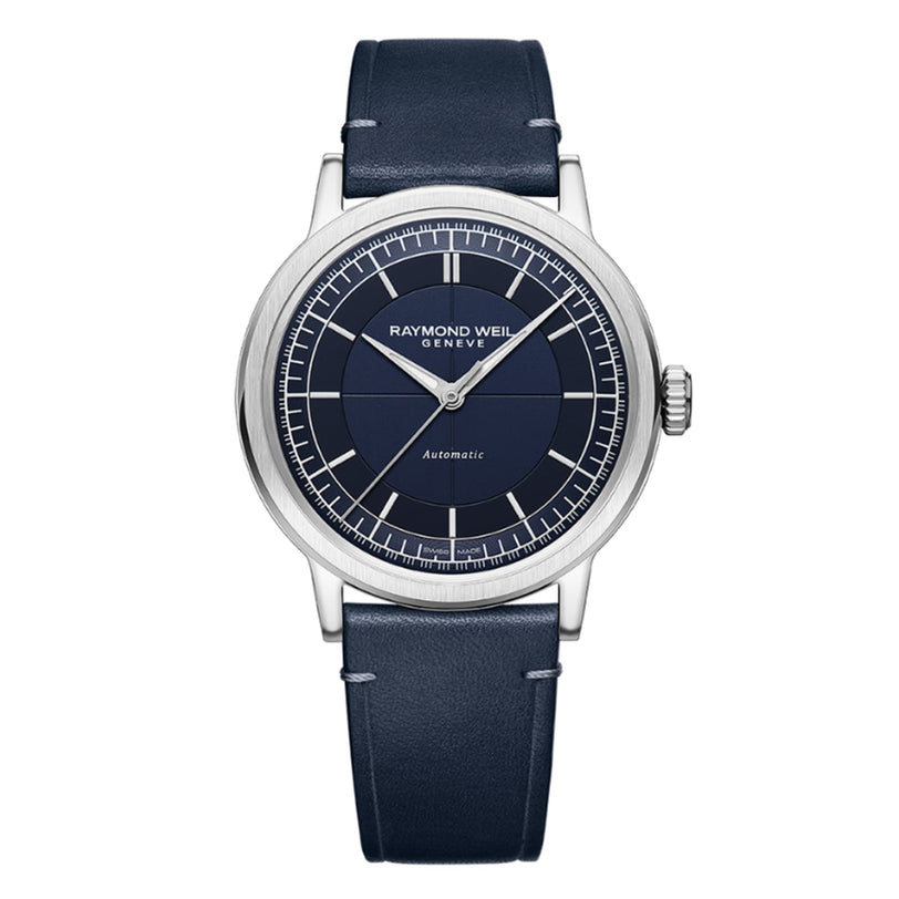 The Raymond Weil Millesime Automatic Blue Sector Dial features a vintage-inspired design with a blue dial, matching leather strap, silver case, minimalist hour markers, and durable sapphire crystal.