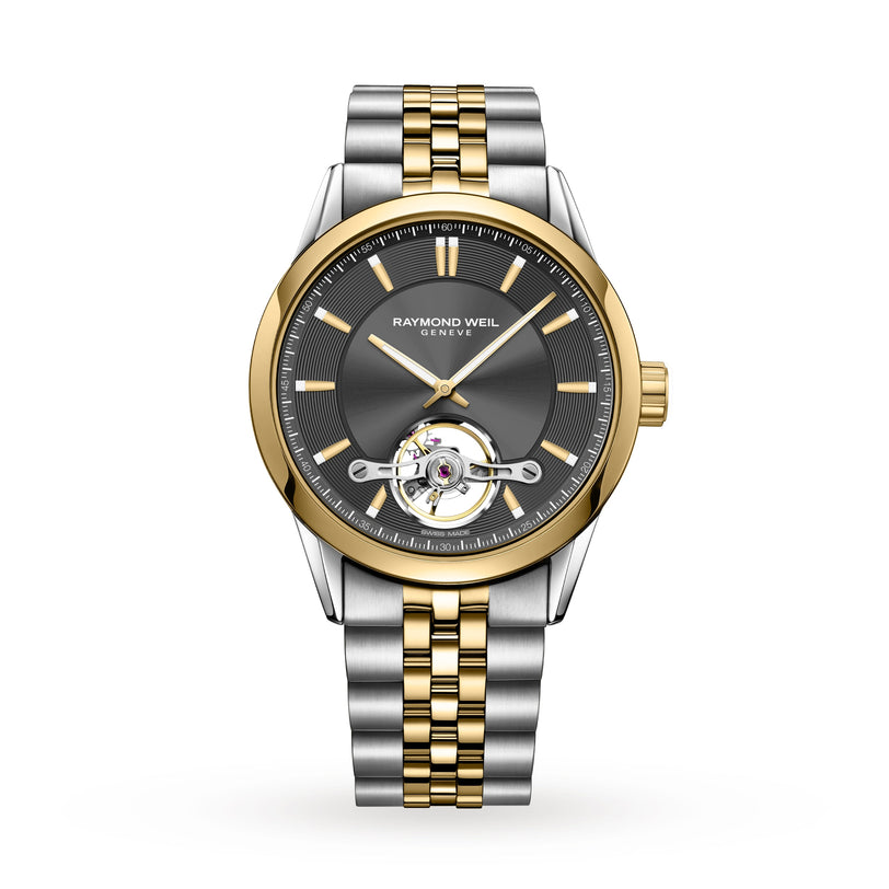 The Raymond Weil Freelancer Automatic Grey Dial wristwatch features a gray dial, gold bezel, two-tone bracelet, and visible tourbillon at 6 oclock—an elegant design that epitomizes fine mechanical watchmaking.