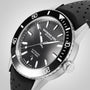 The Raymond Weil Freelancer Diver Black Dial watch features a sleek black dial, black bezel, perforated strap, and date display at 6 o’clock—a refined choice for those seeking affordable luxury.