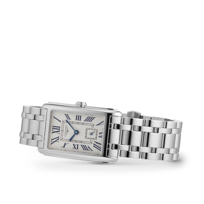 The Longines DolceVita watch boasts a rectangular stainless steel case, metal link band, Roman numeral hour markers, date window, and blue sword-shaped hands, shown on a white background.