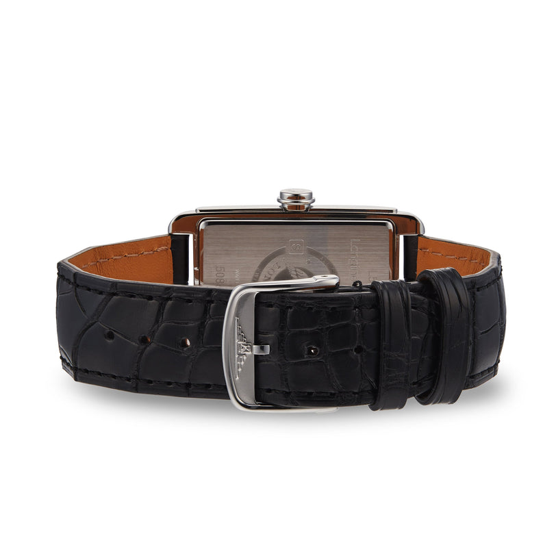 A close-up of the Longines DolceVita wristwatch showcases its rectangular stainless steel case and black leather strap with a silver buckle.