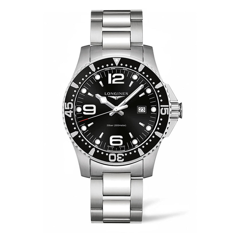 The Longines HydroConquest, a stainless steel wristwatch with a black dial, bold white numerals, date display, and link bracelet, is shown against a white background—an ideal quartz water sports watch.