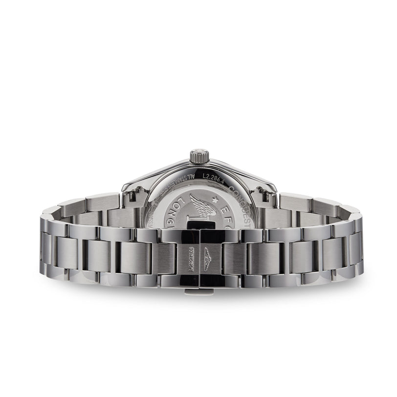 The Longines Conquest Classic, shown from the back, features a linked stainless steel bracelet and an engraved case—showcasing the refined craftsmanship of this elegant timepiece.