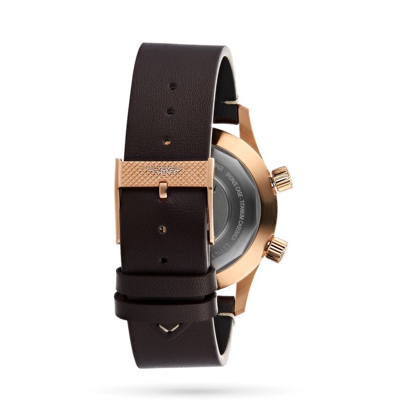 Back view of the Longines Legend Diver Bronze, featuring a brown leather strap with a gold buckle and bronze case, highlighting the clasp and adjustment holes.