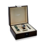 The Longines Legend Diver Bronze watch set features a bronze case, extra green strap, tool, and buckle, all presented in a wooden case with a cream interior.